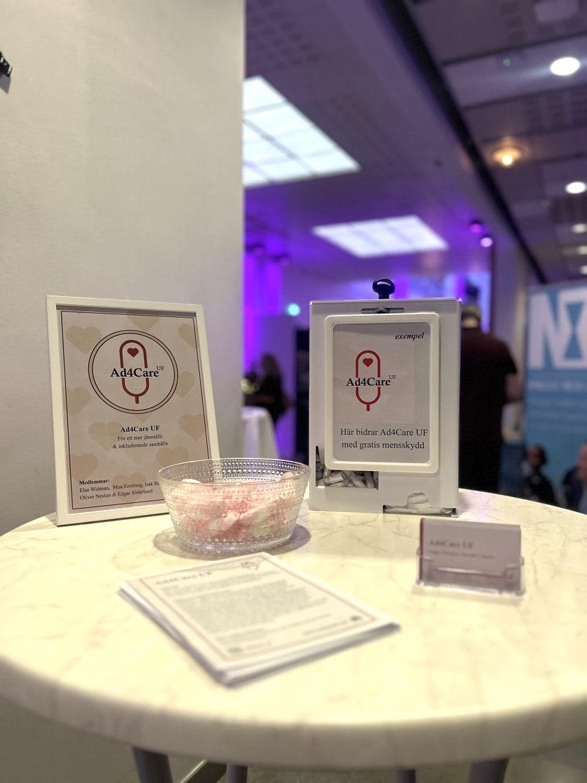 a plastic cup sitting on top of a colorful surface